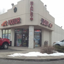 a red truck parked in front of the store