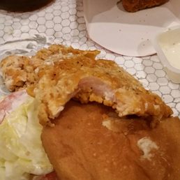 a chicken sandwich with coleslaw and coleslaw a chicken sandwich with coleslaw and coleslaw