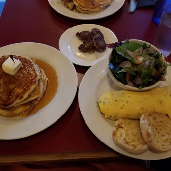 The Red Wagon - Smoked salmon omelette with a salad and an english muffin instead of toast, pulled pork pancakes, and a side of sausage. - Diners Near Me - Vancouver, British Columbia