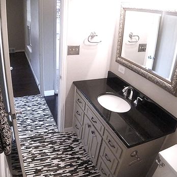 Refined Realty - Black Galaxy Granite, undermount sink & glass tiles in flooring. - Real Estate Services Near Me - Dallas, Texas
