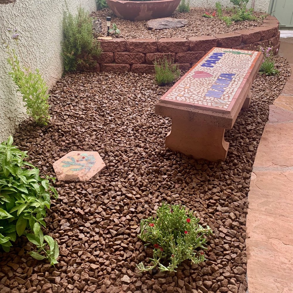 Action Yard and Tree Service - A close-up of the plants and decorative stone. Each plant has an irrigation spout to it that's set to a timer for watering. - Tree Services Near Me - Tucson, Arizona Action Yard and Tree Service - A close-up of the plants and decorative stone. Each plant has an irrigation spout to it that's set to a timer for watering. - Tree Services Near Me - Tucson, Arizona