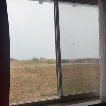 Oceanfront Lodge - This was "partial ocean view" - weeds - Hotels Near Me - Crescent City, California