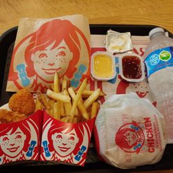 Wendy's - What I got. 4 spicy chicken nuggets, chicken sandwich, fries and a bottled water. With a cookie on the side