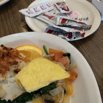 Moke's Bread & Breakfast - My unfortunately firm omelette.  It looked like something McDonalds would serve. - Breakfast & Brunch Near Me - Kailua, Hawaii