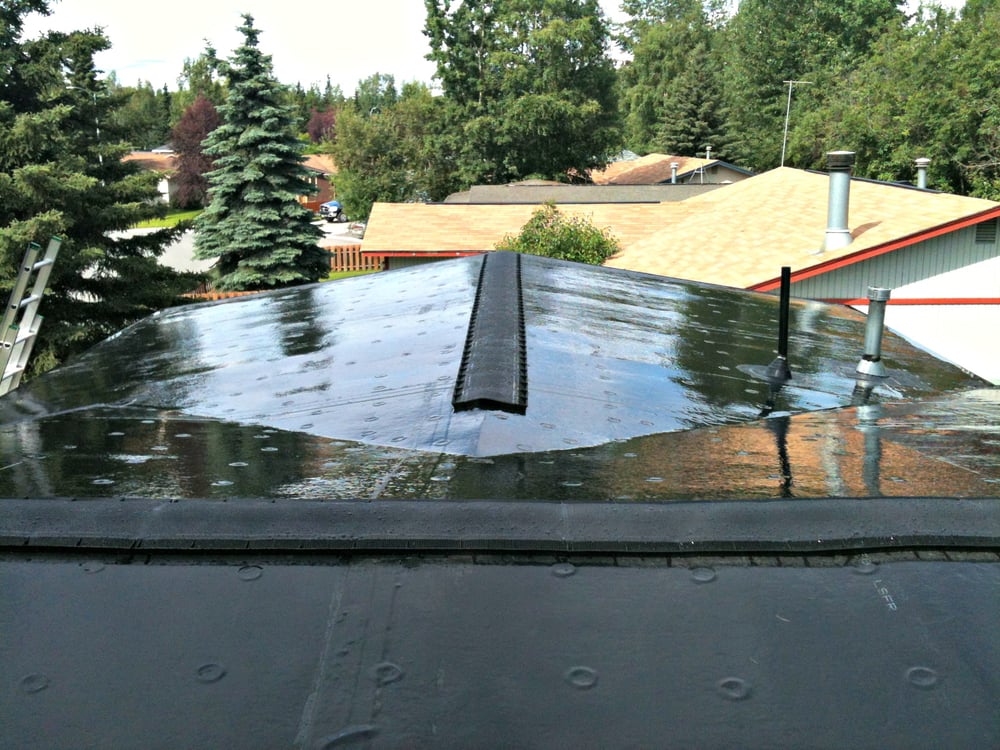 Slide of Storm Proof Roofing