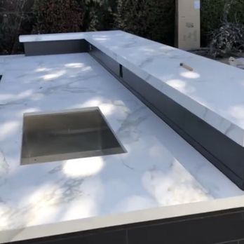 Giallo Stone - Complete with a bar height seating area for 10. Andrey's brilliant idea. - Kitchen & Bath Near Me - Los Angeles, California