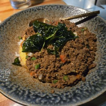 Khanom Thai - Spicy basil sauce with ground bison with rice and fried egg. Incredible! - Thai Near Me - Bozeman, Montana Khanom Thai - Spicy basil sauce with ground bison with rice and fried egg. Incredible! - Thai Near Me - Bozeman, Montana