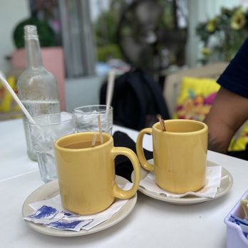 Birdcage Cafe - two cups of coffee on a table - American Near Me - Miami Beach, Florida Birdcage Cafe - two cups of coffee on a table - American Near Me - Miami Beach, Florida