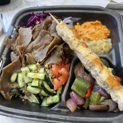 Apola Greek Grill - This was their half chicken and lamb gyro plate with their delicious Paklava! Aunthentic. Come and enjoy!