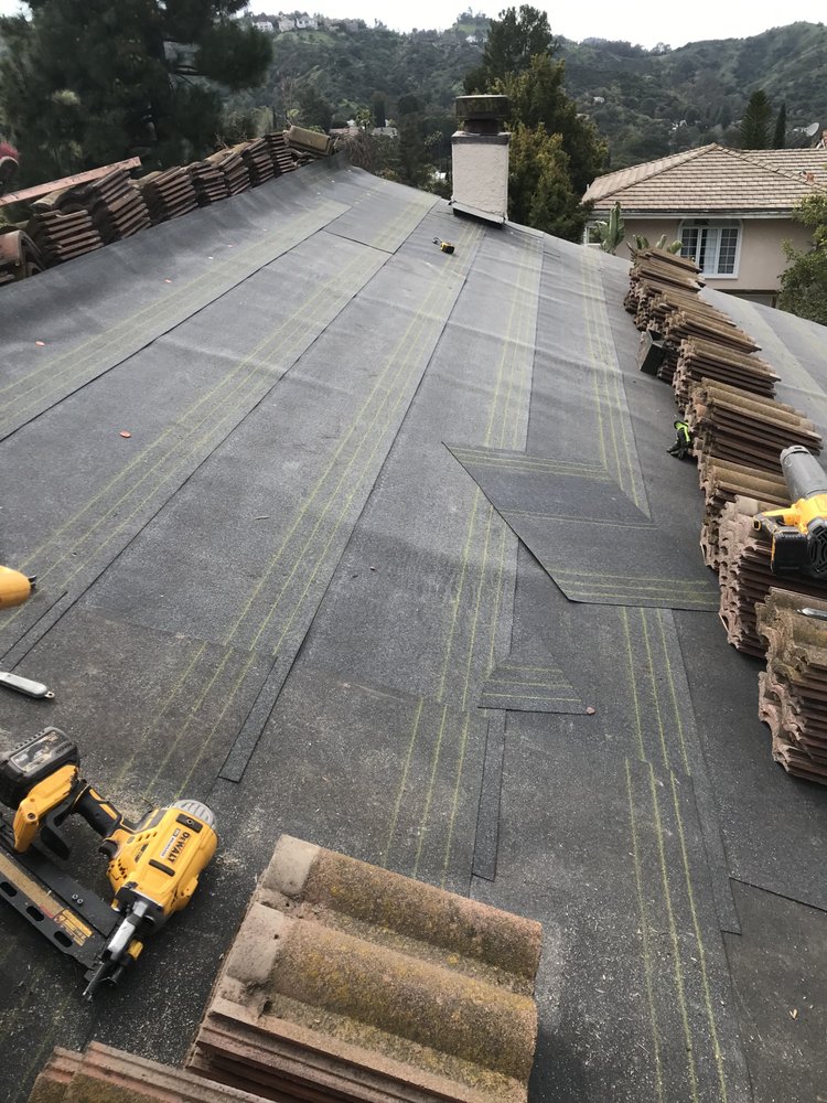 Slide of Quiroz And Sons Roofing