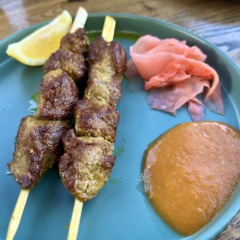 Base Camp - Lamb Skewer $13 Lamb marinated overnight with cumin, coriander, and ginger garlic paste--served with tangy cucumber and tomato achar. - Himalayan/Nepalese Near Me - San Francisco, California Base Camp - Lamb Skewer $13 Lamb marinated overnight with cumin, coriander, and ginger garlic paste--served with tangy cucumber and tomato achar. - Himalayan/Nepalese Near Me - San Francisco, California