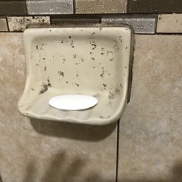 That is mold in the divots of the soap holder That is mold in the divots of the soap holder