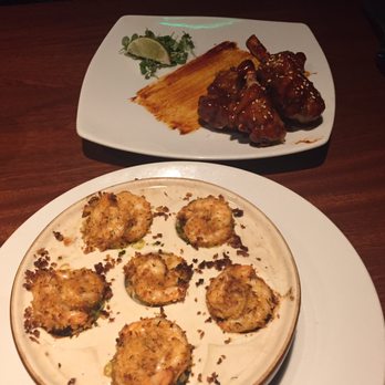 Seasons 52 - Lollipop duck wings and stuffed mushroom with spinach crab and shrimp. - New American Near Me - Princeton, New Jersey Seasons 52 - Lollipop duck wings and stuffed mushroom with spinach crab and shrimp. - New American Near Me - Princeton, New Jersey
