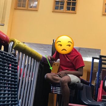 Magic Mountain Fun Center - East - An employee hard at work...oh wait, she didn't look up from her phone unless a child was rattling the gate to be let in or out. - Amusement Parks Near Me - Columbus, Ohio