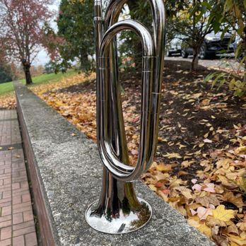 Willamette National Cemetery - Taps is played by a military professional in ceremonial uniform during the quick service. - Funeral Services & Cemeteries Near Me - Happy Valley, Oregon
