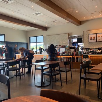 Starbucks - a coffee shop with tables and chairs - Coffee & Tea Near Me - Oak Harbor, Washington
