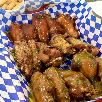 Valley Wings - Top to bottom: regular fries, hot honey wings, lemon pepper wings, and valley gold wings - Chicken Wings Near Me - Scottsdale, Arizona