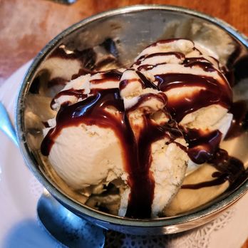 Cork N' Cleaver - Vanilla bean ice cream with chocolate sauce - Steakhouses Near Me - Fort Wayne, Indiana