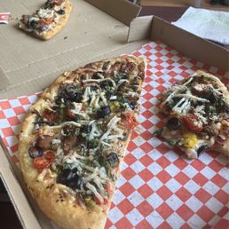 Four large slices in their personal size. This fed two adults for lunch. 31DEC25 Four large slices in their personal size. This fed two adults for lunch. 31DEC25