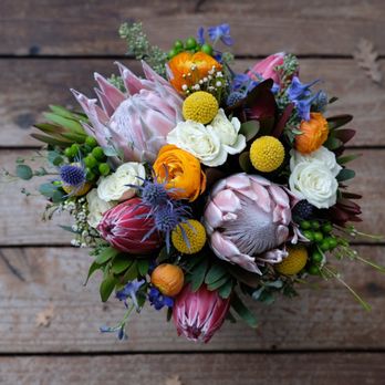 Royal Florist - Wedding bouquet (day 3, still beautiful - a few of the blue flowers were done, and ranunculus buds have opened a bit) - Florists Near Me - Sacramento, California Royal Florist - Wedding bouquet (day 3, still beautiful - a few of the blue flowers were done, and ranunculus buds have opened a bit) - Florists Near Me - Sacramento, California