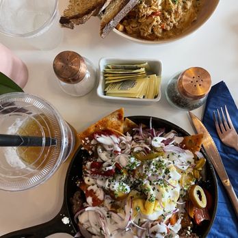 Nightingale - Crab Hashlet Omelet on top. Chilaquiles on bottom. Super good! - Breakfast & Brunch Near Me - Huntington Beach, California Nightingale - Crab Hashlet Omelet on top. Chilaquiles on bottom. Super good! - Breakfast & Brunch Near Me - Huntington Beach, California