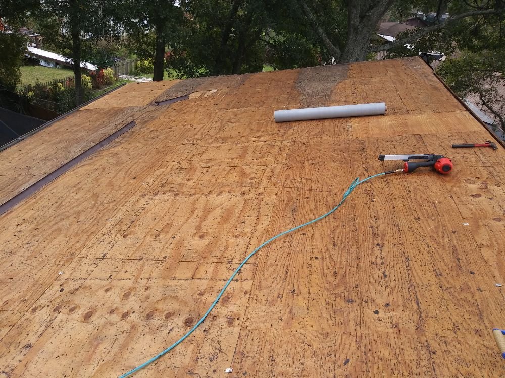 Slide of Saranovic & sons roofing