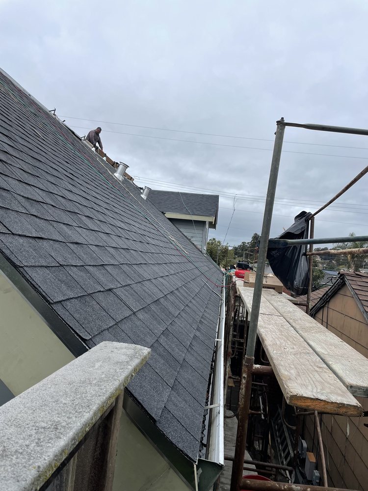 Slide of Al Jr's Roofing