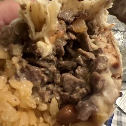 A super burrito w/so much meat! A super burrito w/so much meat!