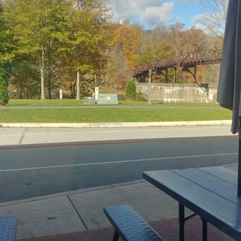 Falls Market - Looking toward the falls through the restaurant window - Burgers Near Me - Ohiopyle, Pennsylvania Falls Market - Looking toward the falls through the restaurant window - Burgers Near Me - Ohiopyle, Pennsylvania