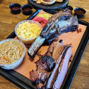 BBQ Station - Our spread: brisket, dino rib, seasoned rice, and mac n cheese, side of bread. This is a lot of food for 3 of us!! - Barbeque Near Me - Glendora, California BBQ Station - Our spread: brisket, dino rib, seasoned rice, and mac n cheese, side of bread. This is a lot of food for 3 of us!! - Barbeque Near Me - Glendora, California