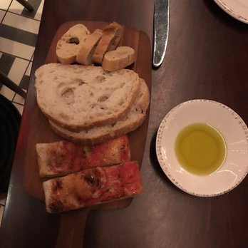 Osteria della Pace - Complimentary Bread with Extra Virgin Olive Oil - Italian Near Me - New York, New York Osteria della Pace - Complimentary Bread with Extra Virgin Olive Oil - Italian Near Me - New York, New York