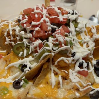 Café Milano - Macho Nachos w/ spicy shredded chicken - American Near Me - Reno, Nevada Café Milano - Macho Nachos w/ spicy shredded chicken - American Near Me - Reno, Nevada