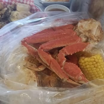 Angry Crab Shack - Snow Crab leg with trifecta sauce, #3, 4 heat with corn, sausage and potatoes. Charred Oysters. - Cajun/Creole Near Me - Phoenix, Arizona Angry Crab Shack - Snow Crab leg with trifecta sauce, #3, 4 heat with corn, sausage and potatoes. Charred Oysters. - Cajun/Creole Near Me - Phoenix, Arizona