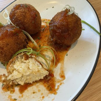 Dish Society - Fried gouda and grit balls with jelly - Southern Near Me - Austin, Texas Dish Society - Fried gouda and grit balls with jelly - Southern Near Me - Austin, Texas
