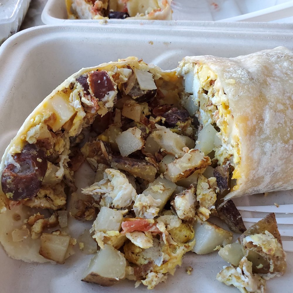 The Sand Trap - Over done sausage and hard under cooked potatoes in the breakfast burrito. - Mexican Near Me - Avalon, California The Sand Trap - Over done sausage and hard under cooked potatoes in the breakfast burrito. - Mexican Near Me - Avalon, California