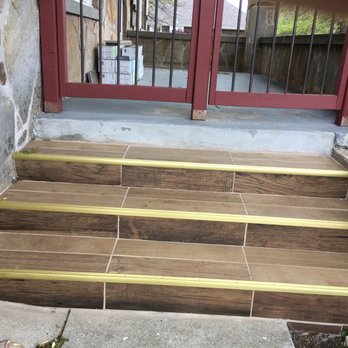 Classic Masonry - Uneven grout lines, interior trim, unfinished job on porch and steps - Masonry/Concrete Near Me - Springfield, Missouri