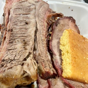 The Redneck BBQ Lab - Beef rib on the left, that was the Sunday special, brisket on the right, with cornbread on top. - Barbeque Near Me - Beaufort, North Carolina The Redneck BBQ Lab - Beef rib on the left, that was the Sunday special, brisket on the right, with cornbread on top. - Barbeque Near Me - Beaufort, North Carolina