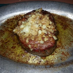 10 ounce sizzling filet mignon topped with sauteed garlic.