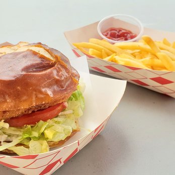 Tabay's Mindful Kitchen - Chkn' sandwich on a pretzel bun. Would order again!!!!! - Food Trucks Near Me - Kahului, Hawaii Tabay's Mindful Kitchen - Chkn' sandwich on a pretzel bun. Would order again!!!!! - Food Trucks Near Me - Kahului, Hawaii