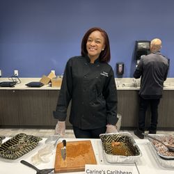 Northland Workforce Training Center - Carine of Carine's Caribbean Cuisine, preparing to teach how to make a Caribbean dish.