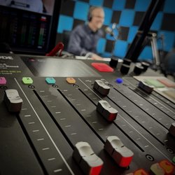 BlueBox Digital - Audio mixing during a Studio A session in Tampa/Lutz. A crew member runs the recording so you can focus on the conversation.
