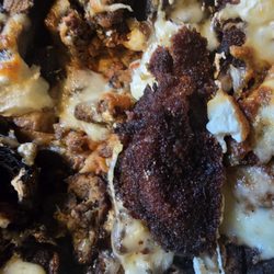Black burnt meatball pizza