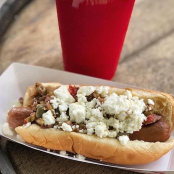The Mad Greek - Nicks Greek dog. Hot dog topped with feta cheese and olive tapenade. - Food Trucks Near Me The Mad Greek - Nicks Greek dog. Hot dog topped with feta cheese and olive tapenade. - Food Trucks Near Me