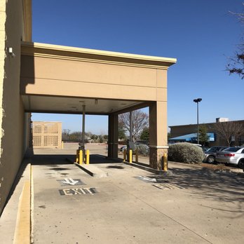 Walmart Supercenter - a parking lot with parking spaces - Department Stores Near Me - Desoto, Texas