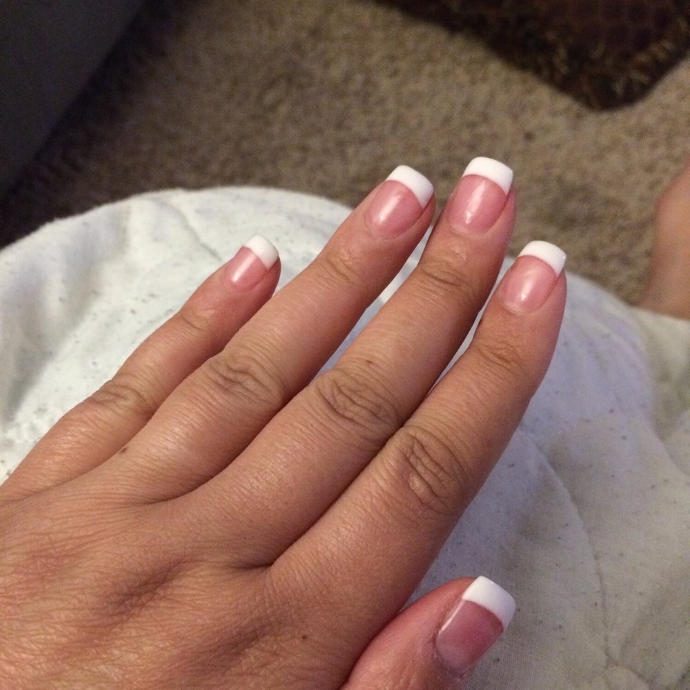 Got solar pink and white nails here. Did a great job.