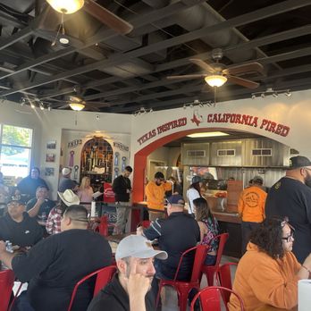 MEGA Texas Barbeque - Inside seating and line against the wall to order. - Caterers Near Me - Fresno, California