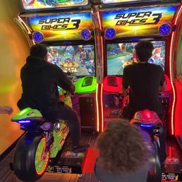 Teenagers enjoyed the arcade Teenagers enjoyed the arcade