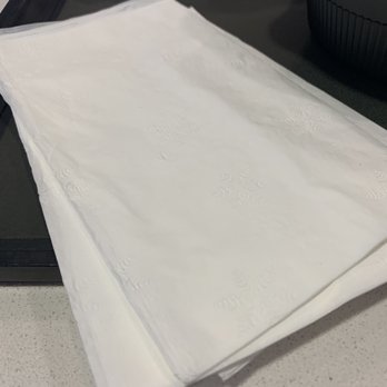 Indus by Saffron - Pile of napkins for each customer! People throw them away without using them. What a waste of trees!! - Indian Near Me - Los Angeles, California