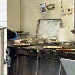 Peddler's Pizza - I made her wear gloves making my pizza.