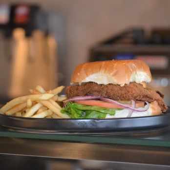 Domingo - a chicken sandwich and french fries on a plate - Coffee & Tea Near Me - Louisville, Kentucky